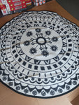 Plastic/ waterproof reversible rug, 180cm diameter, comes with scruffy bag