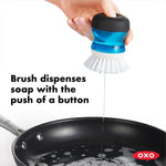 OXO Good Grips Soap Dispensing Palm Brush, condition new but holder base missing