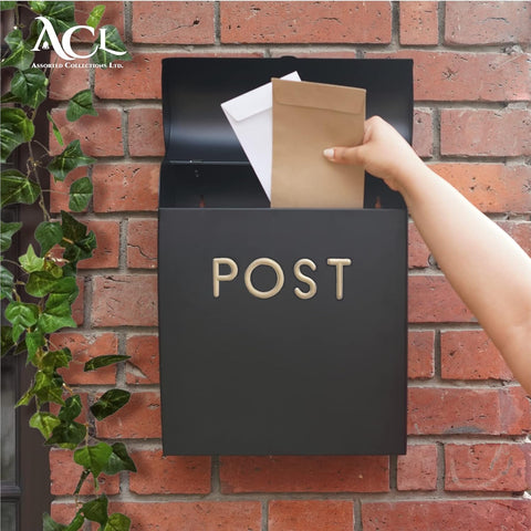 Assorted Collections Black Post Box Wall Mounted Letterbox new but marks on the front, slight dent to the left side of flap, open scruffy box