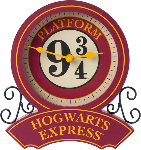 Silver Buffalo Harry Potter Hogwarts Express Platform 9 3/4 Desk Clock- used good, the battery cover is missing, front glass loose, unglued , no original packaging