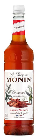 Monin Cinnamon Syrup 1L- plastic bottle- best before 03/25-  scruffy/dirty bottle/label